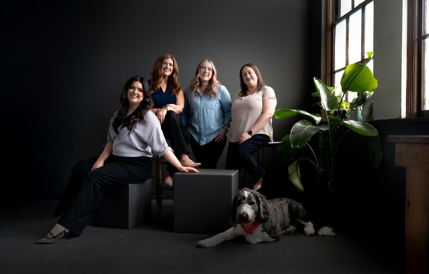 Loriann Fetter team in modern studio setting